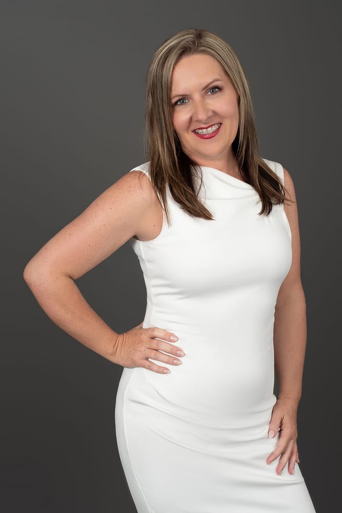 confident-woman-white-dress-standing-hand-on-hip-headshot-personal-branding-Amy Paris Photography-Munster IN
